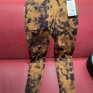 Lululemon joggers size XS mens (look adorable on young girls too!  Never worn.